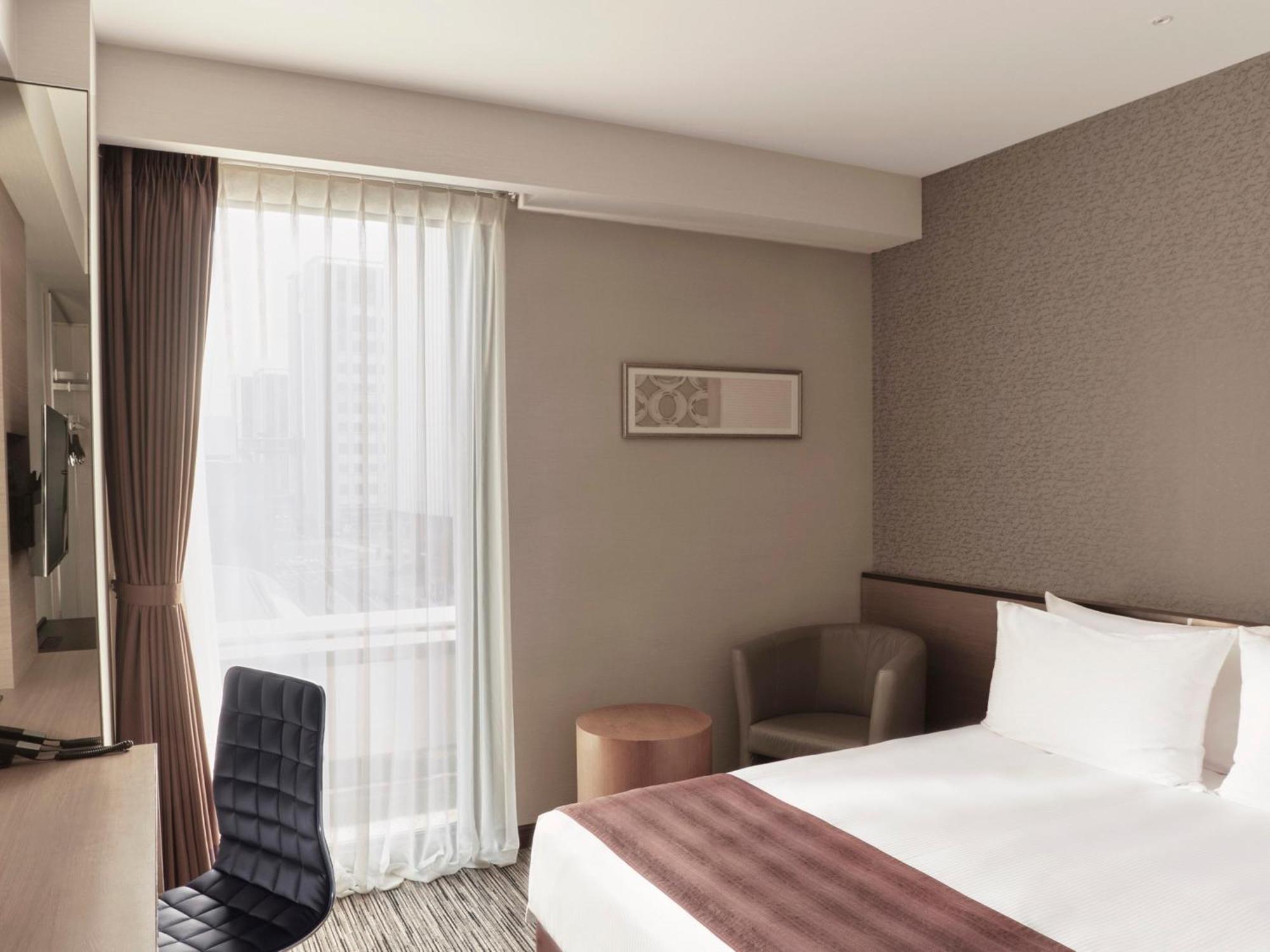 The Strings Hotel Нагоя Экстерьер фото