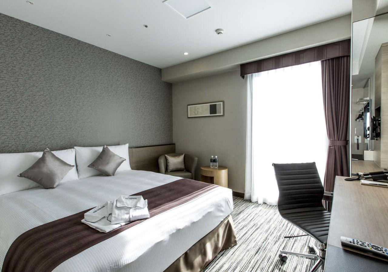 The Strings Hotel Нагоя Экстерьер фото