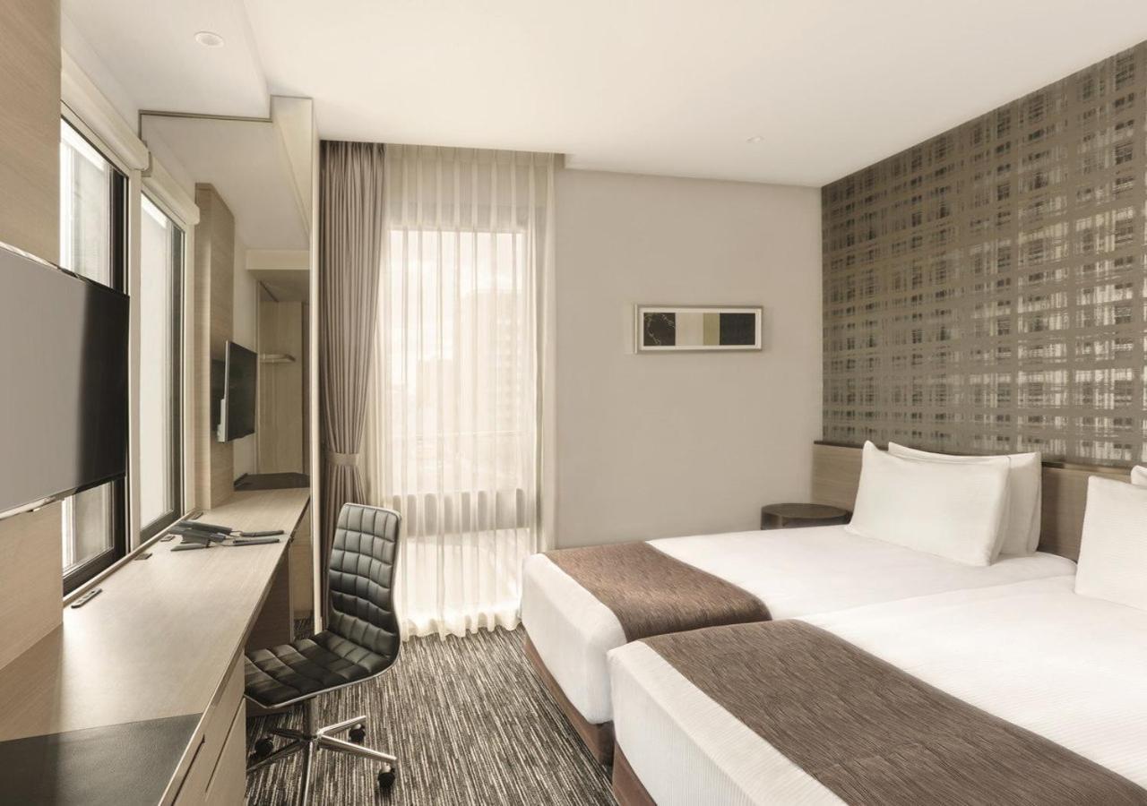 The Strings Hotel Нагоя Экстерьер фото